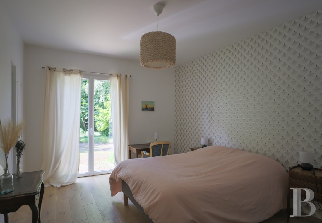En Normandie, dans le parc régional des Boucles de la Seine, une villa de style anglo-normand - photo  n°20